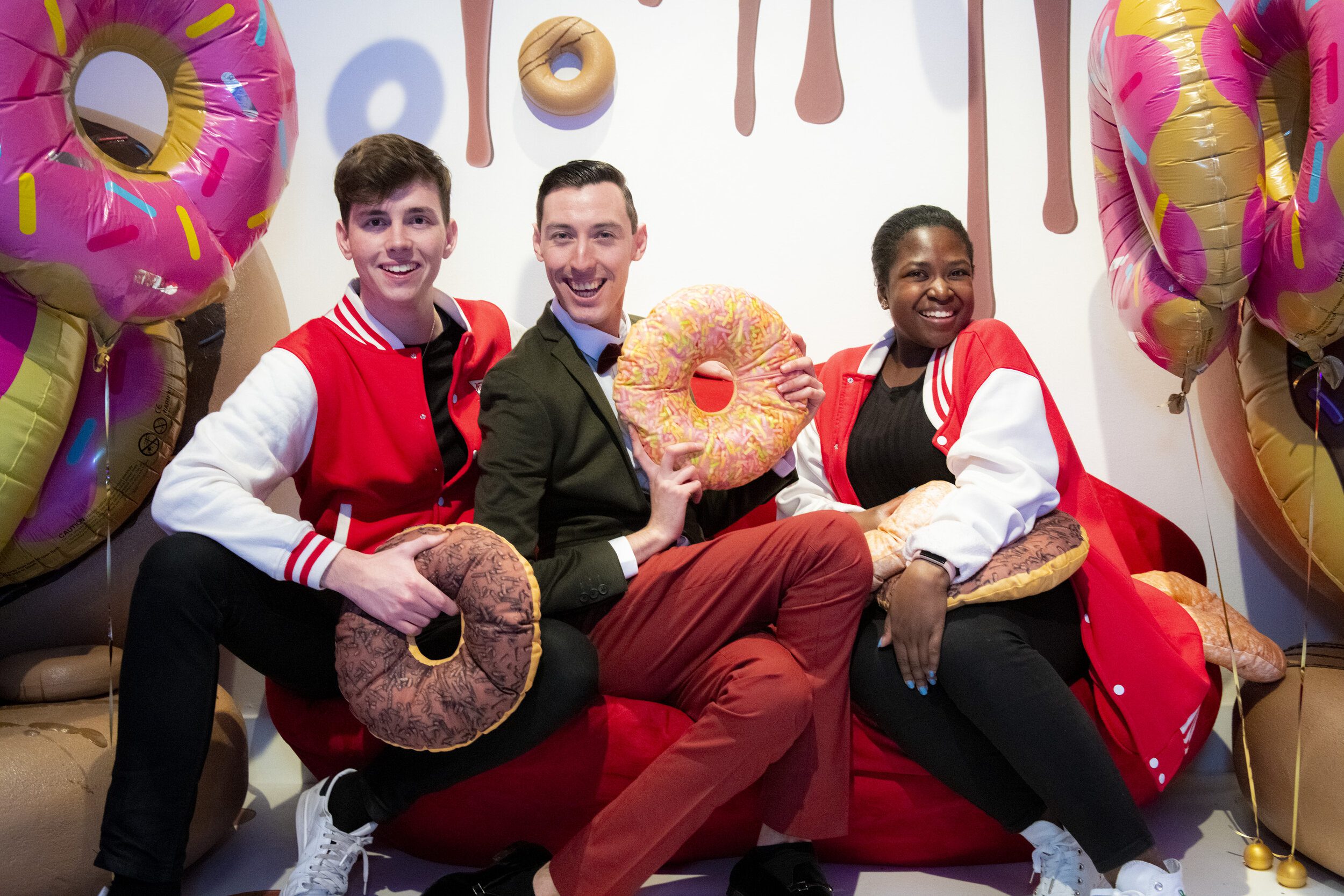 Hel's event staff with Krispy Kreme doughnut cushions