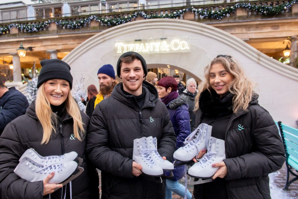 Team with skates at Tiffany & Co. event