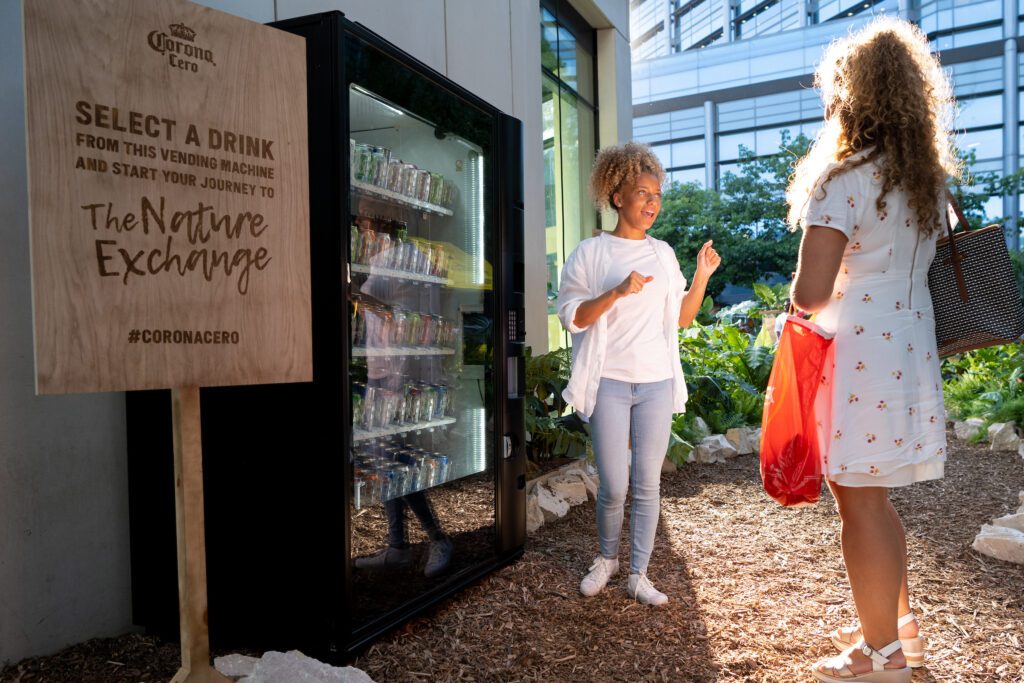 Brand ambassador showing customers drinks